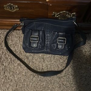 Blue crossbody bag.  Lots of pockets.